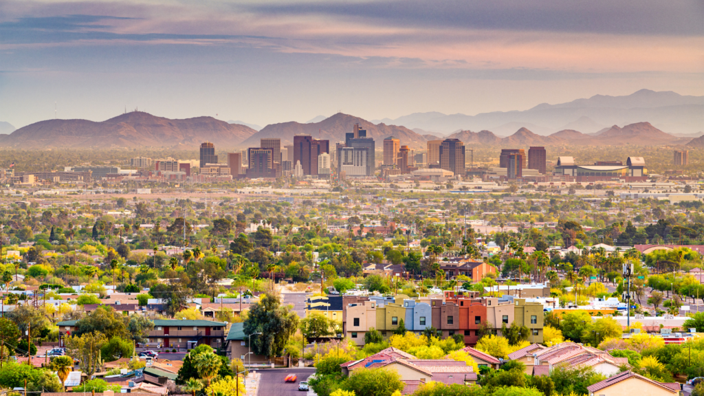 Arizona cityscape with trees and colorful buildings.
