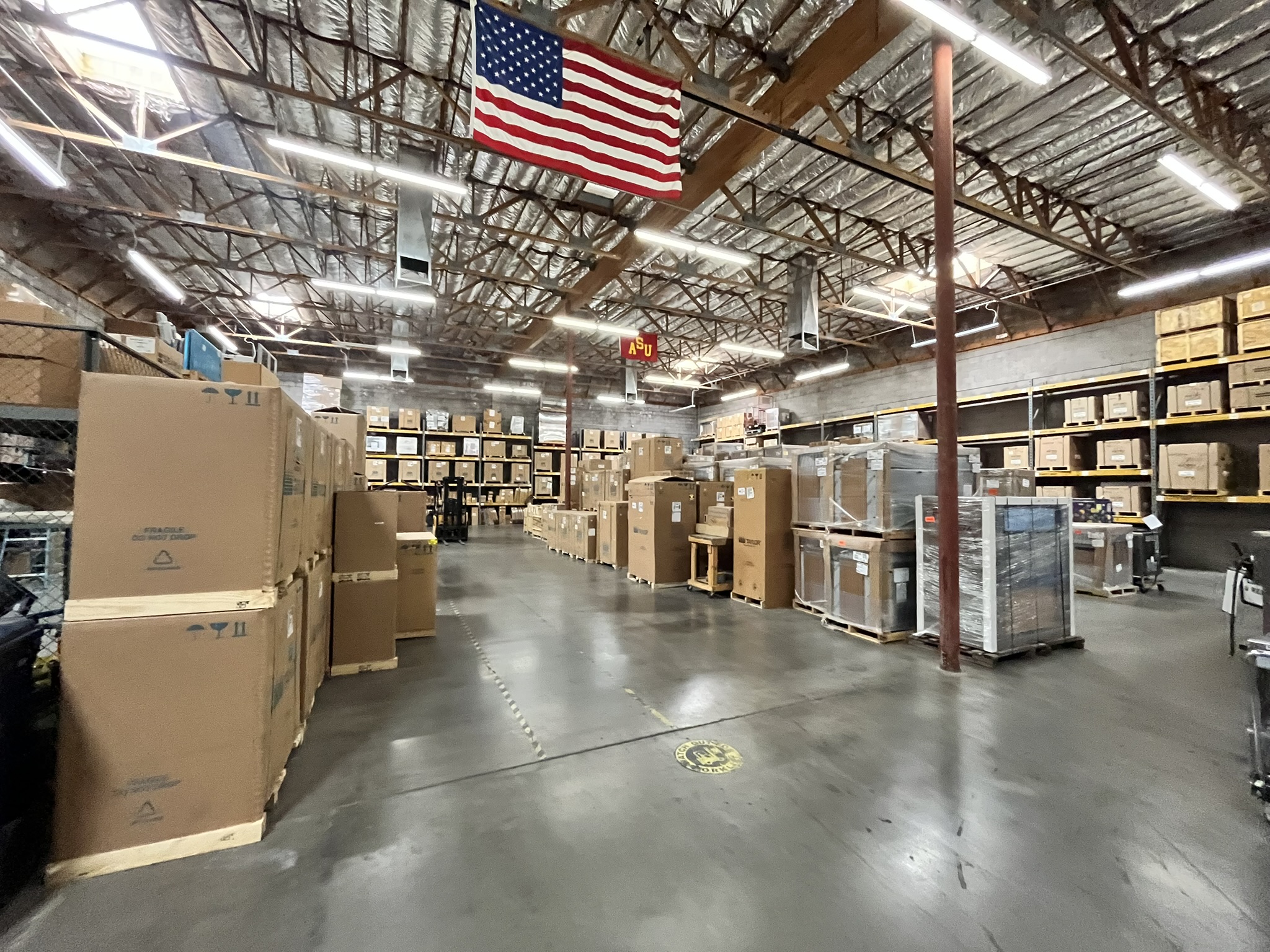 Warehouse with the American flag hung up.