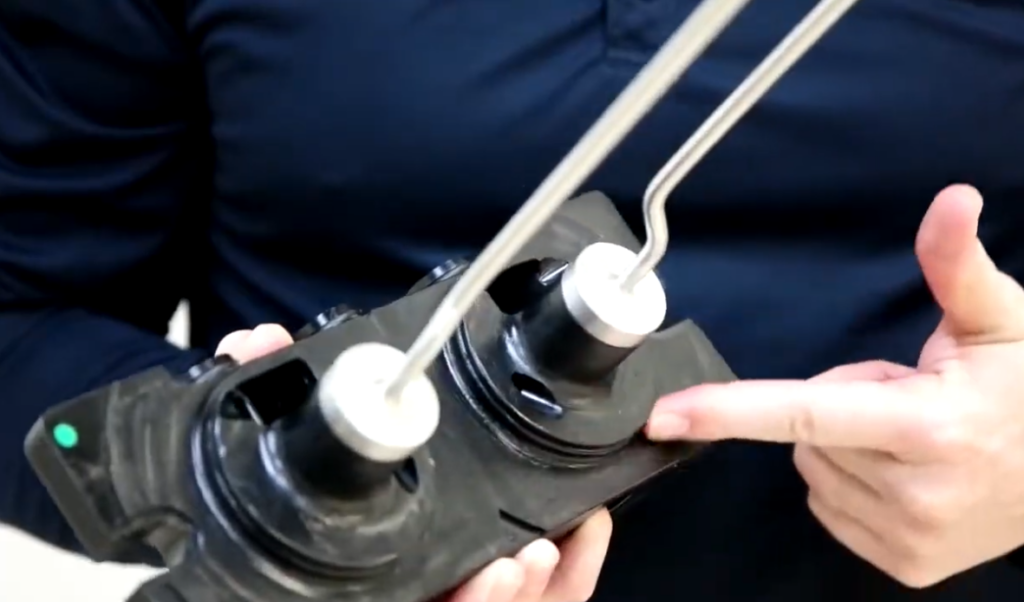 service technician discusses machine maintenance
