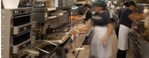 workers in fast food kitchen
