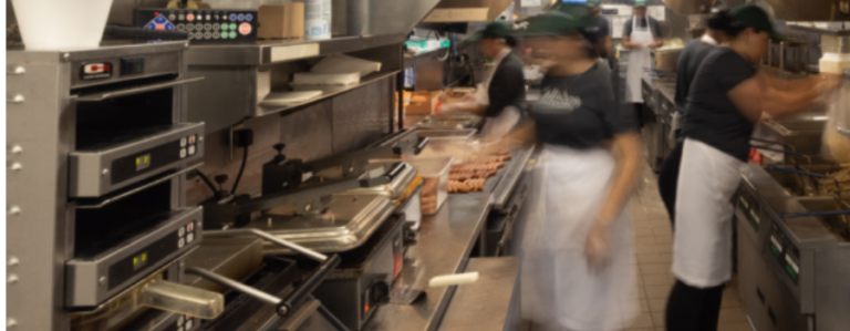 workers in fast food kitchen