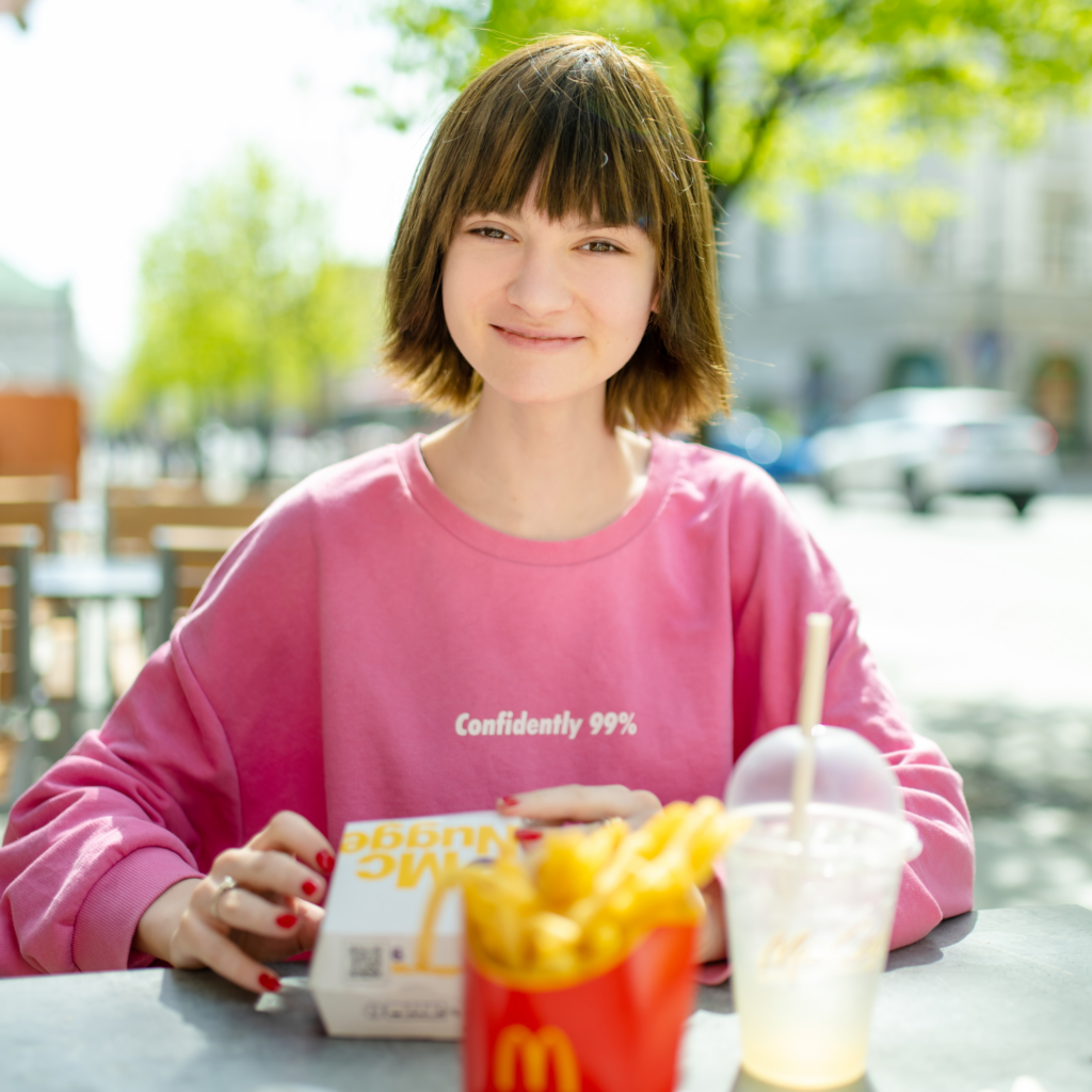 Girl Enjoying McDonalds Fast Food